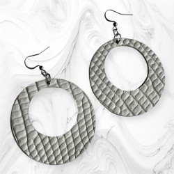 boucles d'oreilles ZOÉ en cuir noir et blanc vues de dos