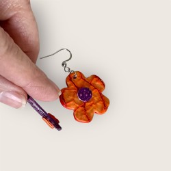 BIJOUX ASYMÉTRIQUES EN CUIR VUE DE PROFIL