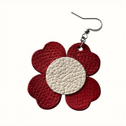 Gros plan sur une boucle d'oreille en cuir rouge et crème