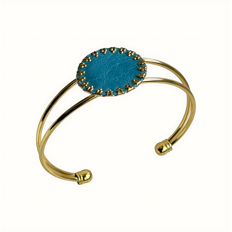 Bracelet jonc en acier inoxydable et cuir bleu en son centre
