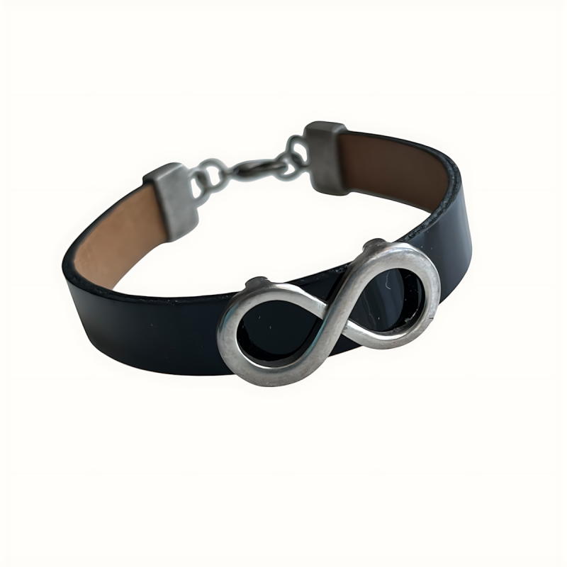 Bracelet en cuir noir avec une perle plate centrale au motif de l'infini